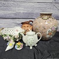 Group shot of all six ceramic and porcelain pieces