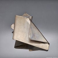 Front view showing folded abstract design