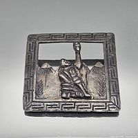 Front view of square sterling silver brooch with Andean scene