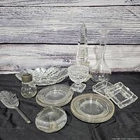 Group shot showing all 11 clear glass items