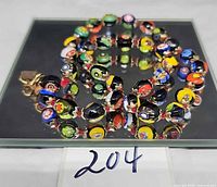 Coiled necklace showing multicoloured Millefiori beads and clasp