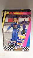 Front view of boxed Barbie showing doll and graphics