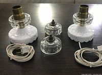 Top view of both lamps showing sockets, bases, cords, loose clear glass collars