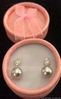 pair of rhinestone and faux pearl stud drop earrings in pink round box