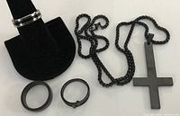 Overview showing necklace and three rings