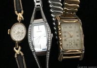 Group shot of three wristwatches