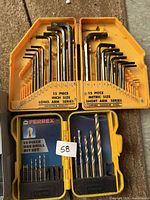 Yellow plastic cases with inch and metric hex key sets and Ferrex drill bit set