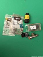 All items arranged on green background