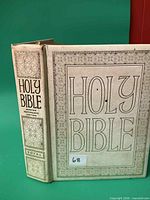 Front cover and spine showing title and Royal marking