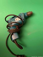 Full view of Makita hammer drill front side with cord