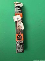 Front view of boxed Paslode framing fuel cell