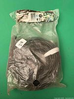 Front view of sealed Orbit Potted Plants Kit showing coiled tubing