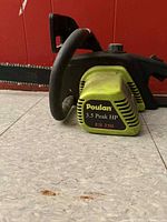 Left side showing Poulan logo, 3.5 Peak HP label, front handle and part of bar