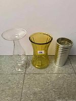 All three vases standing side by side