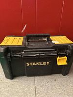 Front view of black Stanley toolbox closed