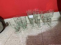 All ten Vidreco recycled glass wine glasses on floor
