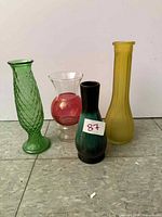 Group shot of four vintage glass vases