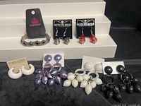 All jewellery displayed on stepped white stand