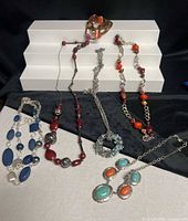 All six necklaces laid out for full view