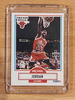 Front of 1990 Fleer Michael Jordan #26 card in holder