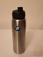 Full view of BMW stainless water bottle upright