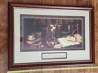 Full view of framed print showing image, matting and frame