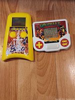 Front view of both handheld games