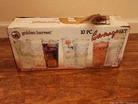 Box showing Golden Harvest 10-piece beverage set branding
