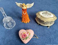 All four items arranged on blue background