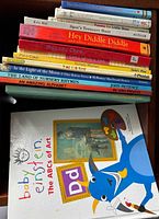 Stack of children’s books showing multiple spines