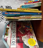 Stacked books showing spines and titles