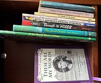 Books on shelf showing titles