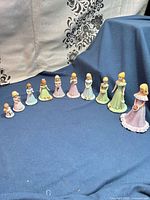 All 10 figurines lined up in ascending size order