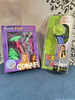 Front view of both Conair kits in sealed packaging