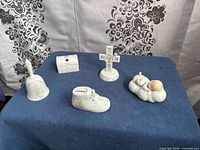 Group shot of all five Precious Moments ceramic items