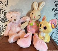 Group shot showing all three plush toys together