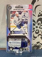 Front of sealed package showing Zamboni toy and Mats Sundin card
