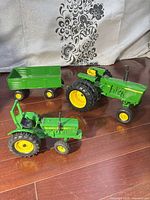 Overview of two tractors and wagon trailer