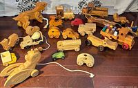 Group shot of all wooden toys on floor