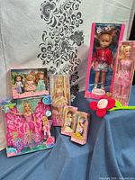 Group shot of all boxed dolls