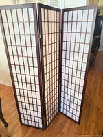 Full view of 3-panel shoji screen standing partially folded