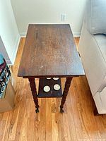 Top view of rectangular end table next to sofa