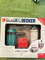 retail box front showing full Expresso Mio kit