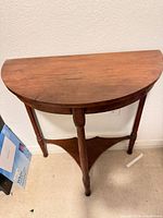 Top view showing half-moon walnut veneer surface