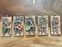 All five medals lined up showing fronts and enamel shields