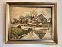 Full view of framed oil landscape painting