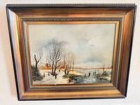 Front view of framed winter landscape oil painting