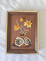 Front view of framed embroidery