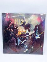 Front cover of KISS Alive! album in plastic sleeve