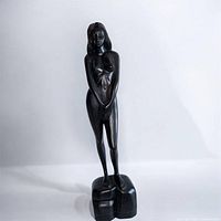 Full view of the standing female nude sculpture